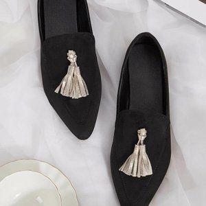 NWOT black suede flats with gold tassels
